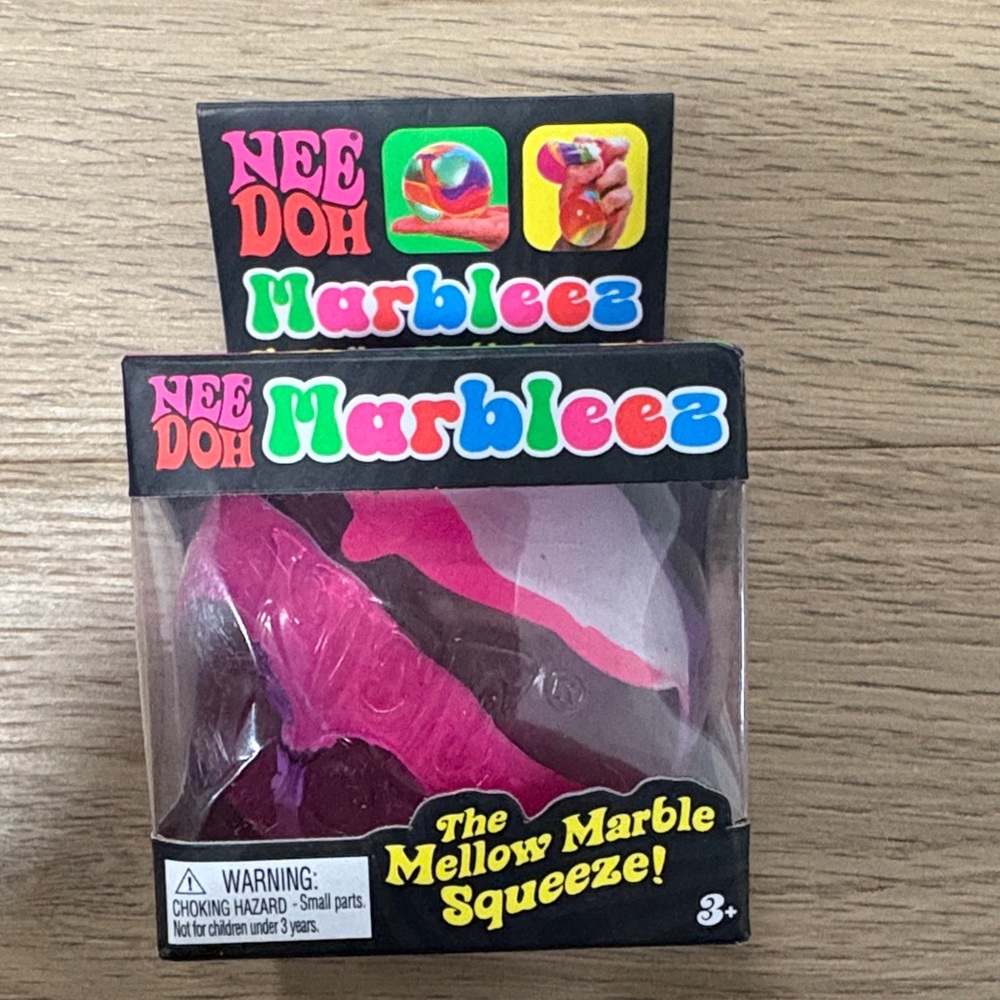 Needoh Stress ball. The Mellow Marble Squeeze. Pink Marble Squeeze Toy